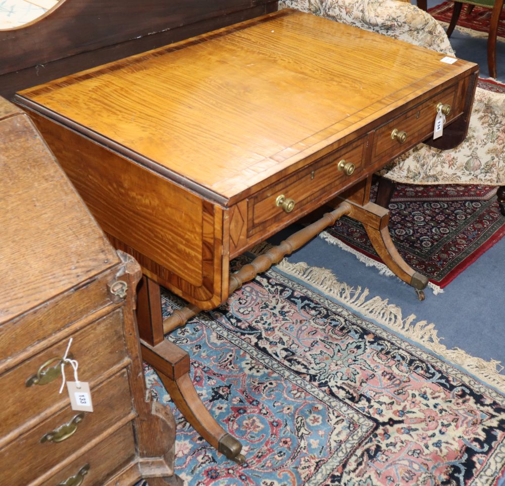 A Regency and later satinwood and tulip wood banded sofa table, W.138cm extended, D.61cm. H.73cm